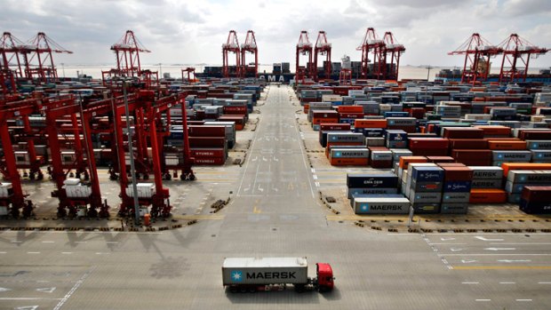 Flurry of activity: Container trucks at the Yangshan Deep Water Port, to be part of the new Shanghai free trade zone.
