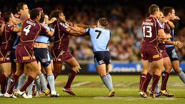 On for young and old ... a fight breaks out in the 20th minute.  The melee saw NSW centre Michael Jennings sin-binned.
