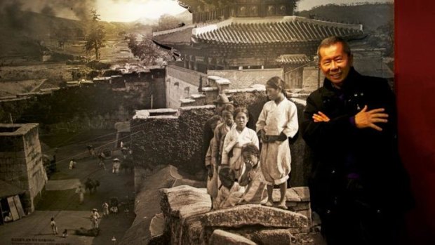 William Yang with one of Clunes-born photographer George Rose's first images from Korea.