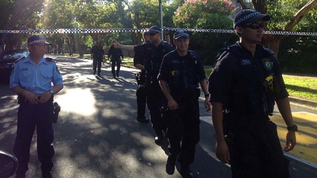 Riot Squad police conduct a line search up Jersey Road, Strathfield.