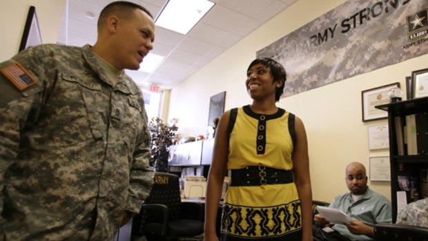 Sergeant Joseph Perdieu talks to recruit Myeshia Townsend at the Largo army recruit centre near Washington DC.