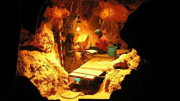 Researchers working in El Sidron Cave.