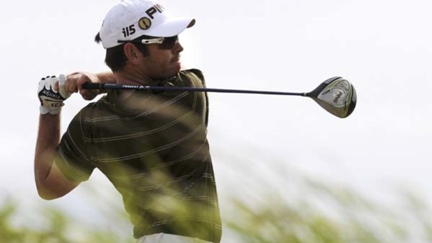 Louis Oosthuizen of South Africa tames the Old Course in St. Andrews, Scotland.