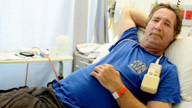 Rod Sommerville recovers after being bitten by an eastern brown snake.