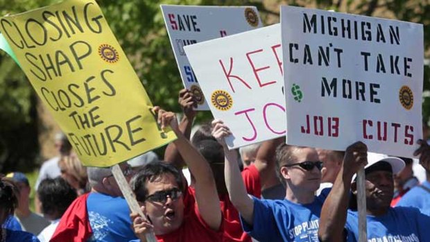 Chrysler auto assembly workers in Michigan rally to save their jobs and protest plant closings.