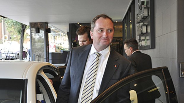 Dumped ... Barnaby Joyce leaves a Perth hotel yesterday after Tony Abbott announced he would not longer be the opposition's finance spokesman.