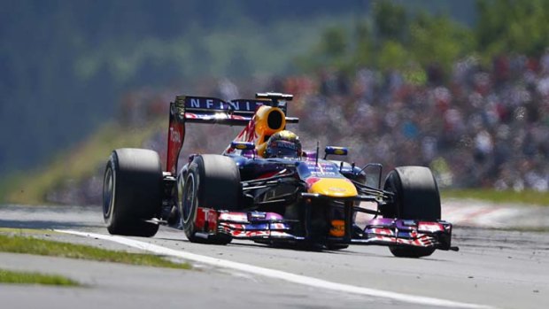 Red Bull driver Sebastian Vettel ahead of the pack during the German F1 Grand Prix at the Nurburgring circuit.
