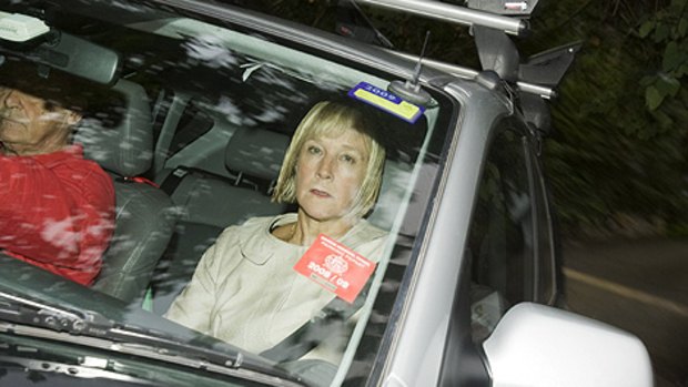 "A most unsatisfactory witness.'' ...  Meredith Hellicar leaving her Mosman home yesterday morning.