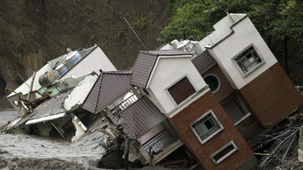 Damaged buildings are seen after Typhoon Morakot swept Kaohsiung county, southern Taiwan.