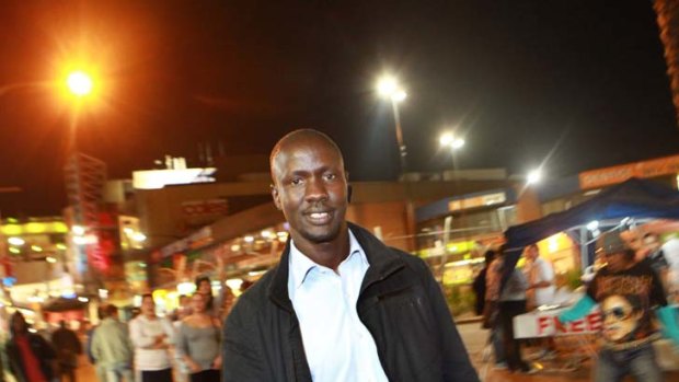 Going far ...  Deng Thiak Adut put himself through law school. Now he helps police and members of the Sudanese community in trouble.