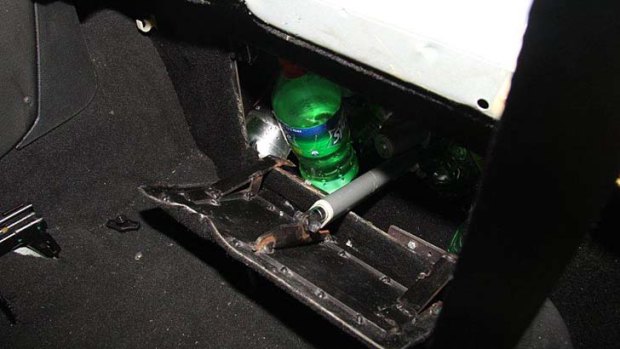 The steel safe hidden behind the front passenger seat of the Holden ute.
