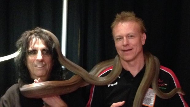 Paul Kenyon with another famous snake handler, rocker Alice Cooper.