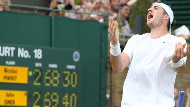 John Isner delights in winning his marathon Wimbledon clash over Nicolas Mahut.