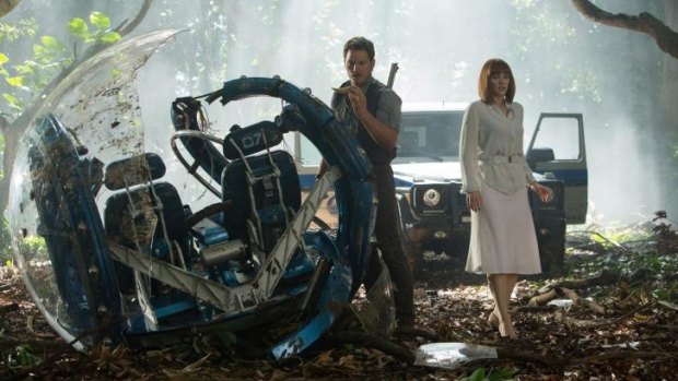 Chris Pratt, left, and Bryce Dallas Howard in a scene from <i>Jurassic World</i>, directed by Colin Trevorrow.