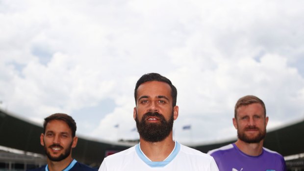 New look: Sydney FC captain Alex Brosque  
and team mates Milos Ninkovic and Andrew Redmayne in the club's new strip for the AFC Champions League.