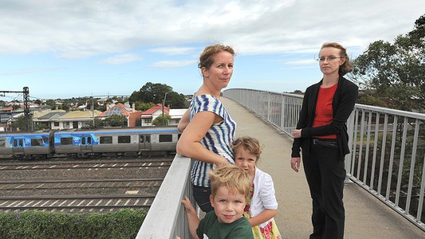 Shannon Lea (left) and Michelle Wyatt oppose plans to demolish two Footscray footbridges.