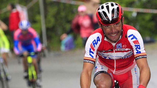 Joaquim Rodriguez of Spain rides his way into the pink jersey.