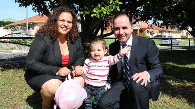 Refused leave to look after her sick daughter: Michelle Rowland with daughter Octavia Chaaya and husband Michael Chaaya.