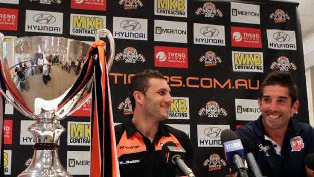 Familiar foes &#8230; Robbie Farah and Braith Anasta, who will line up alongside each other for the Tigers next year, address reporters before the Foundation Cup match last month.