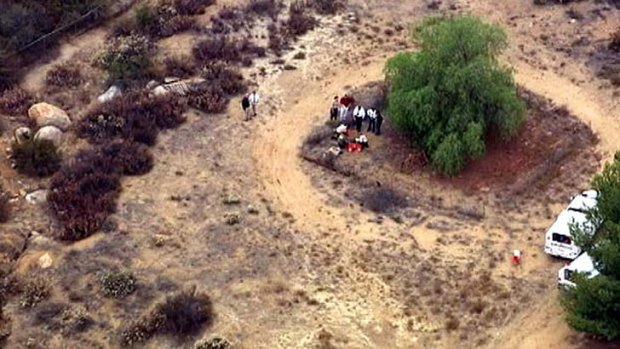 Investigators dig during the search for 11-year-old Terry Smith.