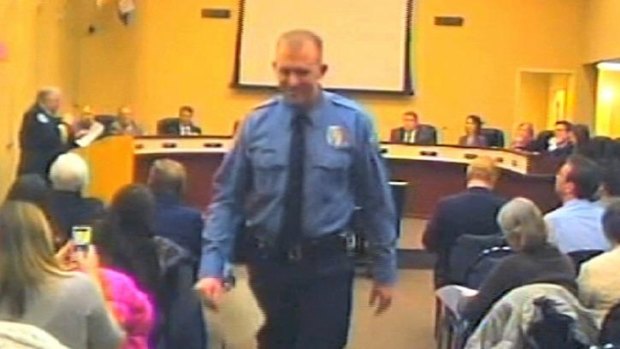 Police officer Darren Wilson attends a city council meeting in Ferguson, Missouri on February 11.