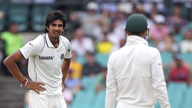 Ishant Sharma shows his disappointment after dropping a return catch off Michael Clarke.
