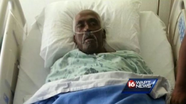 Not dead yet: Farmer Walter Williams makes it onto WAPT News after kicking his way out of a body bag at Porter and Sons Funeral Home in Lexington, Mississippi.