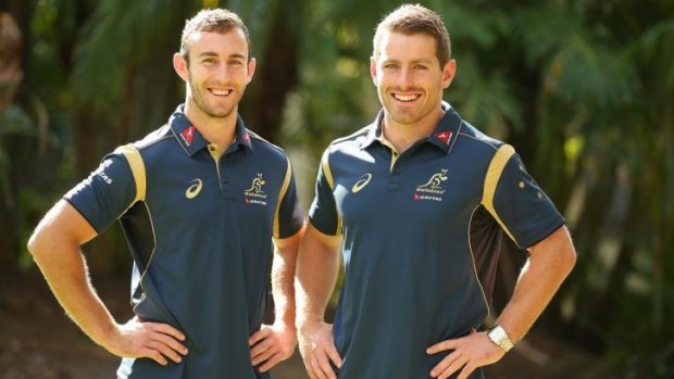 Nic White and Bernard Foley pose for the cameras during Tuesday's announcement of the Wallabies team to take on France.