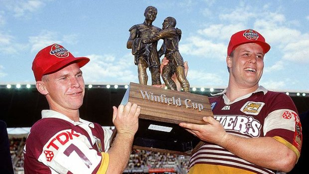 Allan Langer and Glen Lazarus hold aloft the Winfield Cup after winning the Broncos' inaugural premiership in 1992.