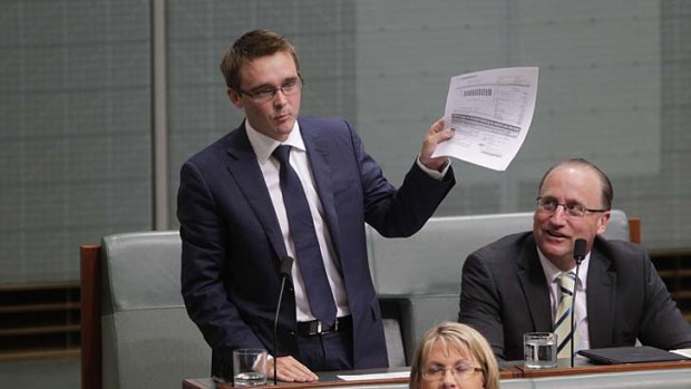 Coalition MP Wyatt Roy presents the government in a power bill in question time.