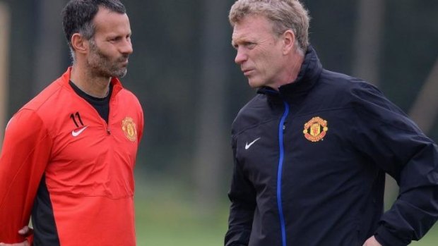 A new atmosphere was noticeable at Carrington once Giggs (L) replaced Moyes.