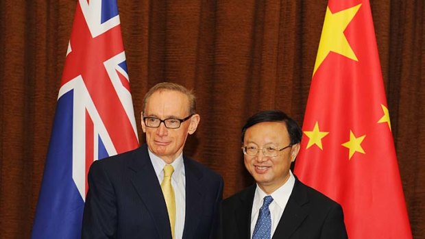 Australian Foreign Minister Bob Carr meets with Chinese Foreign Minister Yang Jiechi.