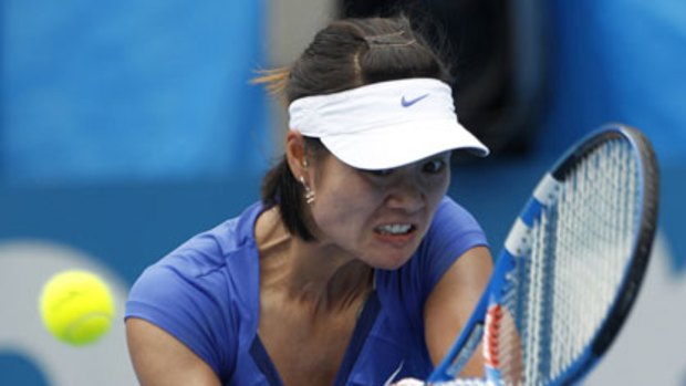 Watchful ... Li Na is all concentration in her three-set battle with Svetlana Kuznetsova at Homebush Bay yesterday.