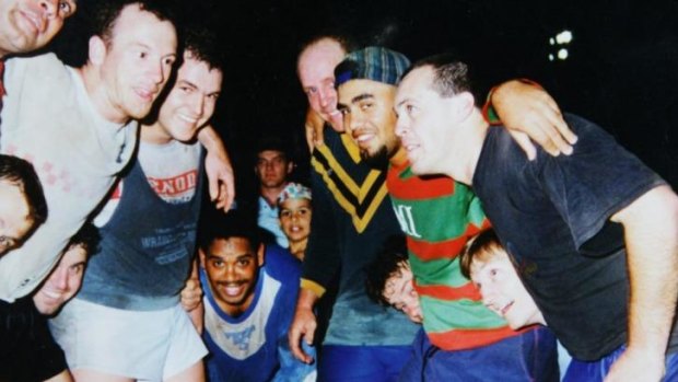 Back in the day: Greg Inglis, wearing the checked cap in the background, with members of the 1995 Macksville first grade side.