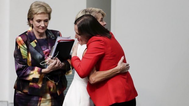 Julie Bishop and Kelly O'Dwyer embrace after the former foreign minister announced her retirement from politics. 