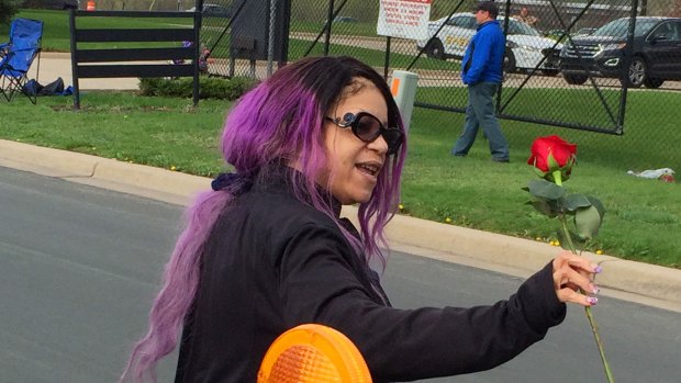 Could receive pop singer's fortune ... Tyka Nelson holds a rose outside Paisley Park, the home of her brother Prince in Chanhassen, Minnesota on Thursday.