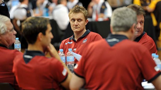 Melbourne coach Mark Neeld doesn't look too excited.