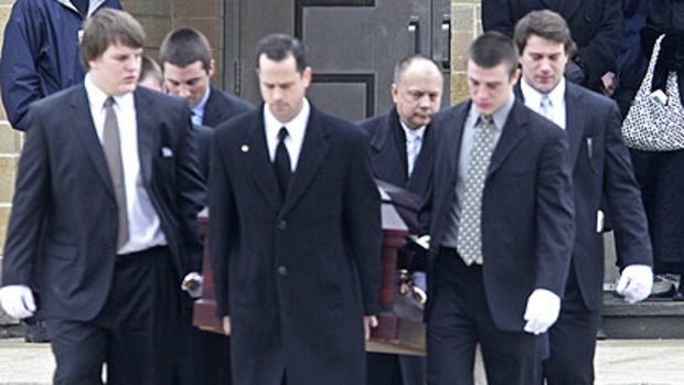 Funeral ... pallbearers carry the casket of SeaWorld trainer Dawn Brancheau, who was killed by a whale.