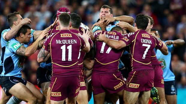 Out of fashion?: Blues and Maroons players fight during game two of State of Origin.