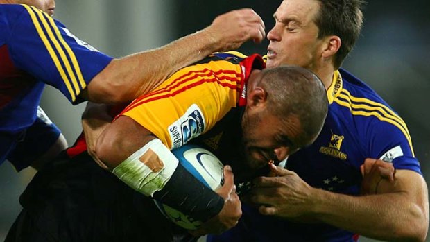 Double trouble &#8230; Ben Afeaki of the Chiefs is tackled.