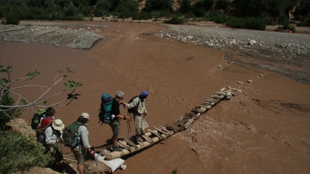 Crossing flooded rivers in the  M'Goun Valley, Morocco, can be hazardous.