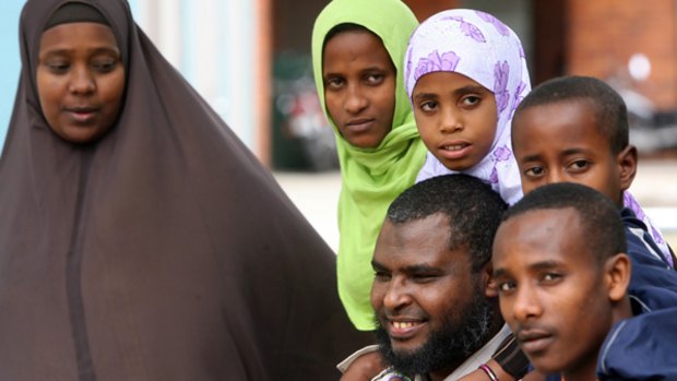 Jemal Ambo from Ethiopia, centre, with his wife Rumana (left) and his children (from left) Lomi, Yasriba, Adel Malik and Awel.