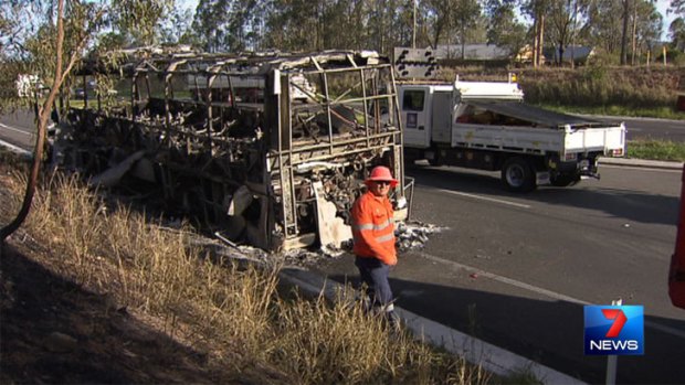The scene of a bus fire on the Warrego Highway on Tuesday. Photo: Seven News.