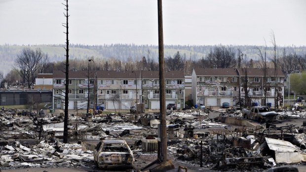 The charred remains of houses in wildfire-ravaged Fort McMurray.
