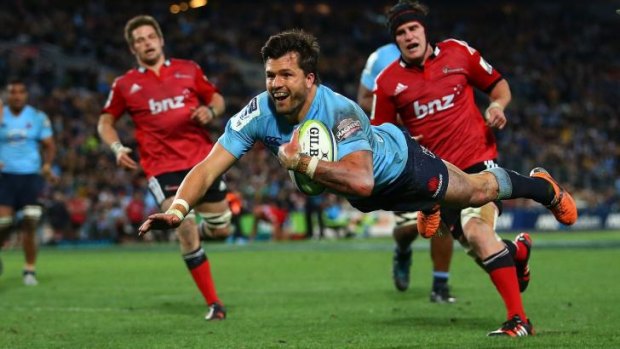 Double down: Adam Ashley-Cooper scores his second try for the Waratahs during Saturday's Super Rugby grand final.