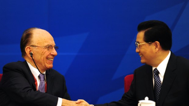 Rupert Murdoch and Chinese President Hu Jintao at the World Media Summit in Beijing.