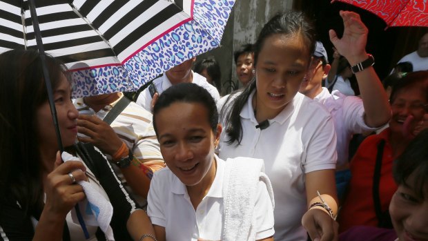 Presidential candidate Senator Grace Poe is greeted by supporters on Tuesday. She is running second to Duterte.