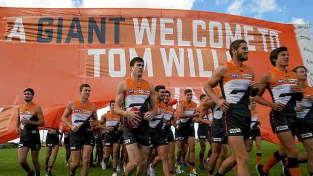 Growing in stature: Giants players launch their new facility at Tom Wills Oval yesterday. Coach Kevin Sheedy believes his winless side can do better than two victoies in their second season.