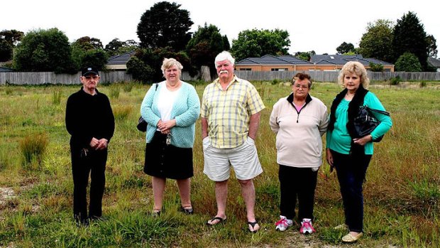 Not welcome ... Doveton residents Noel Johnston, Eileen Lewis, Clive Ritchie, Margaret Monssen and Cynthia Bernardo stand on the site of the proposed mosque.