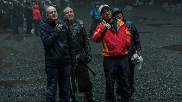 Rainy days: Ben Snow, Ray Winstone and director Darren Aronofsky on the set of Noah.